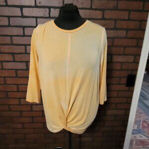 Heart w/Hips front knot top with three quarter length sleeves.